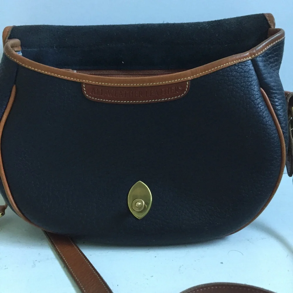 Vintage Dooney  & Bourke  Saddle Cross body Bag